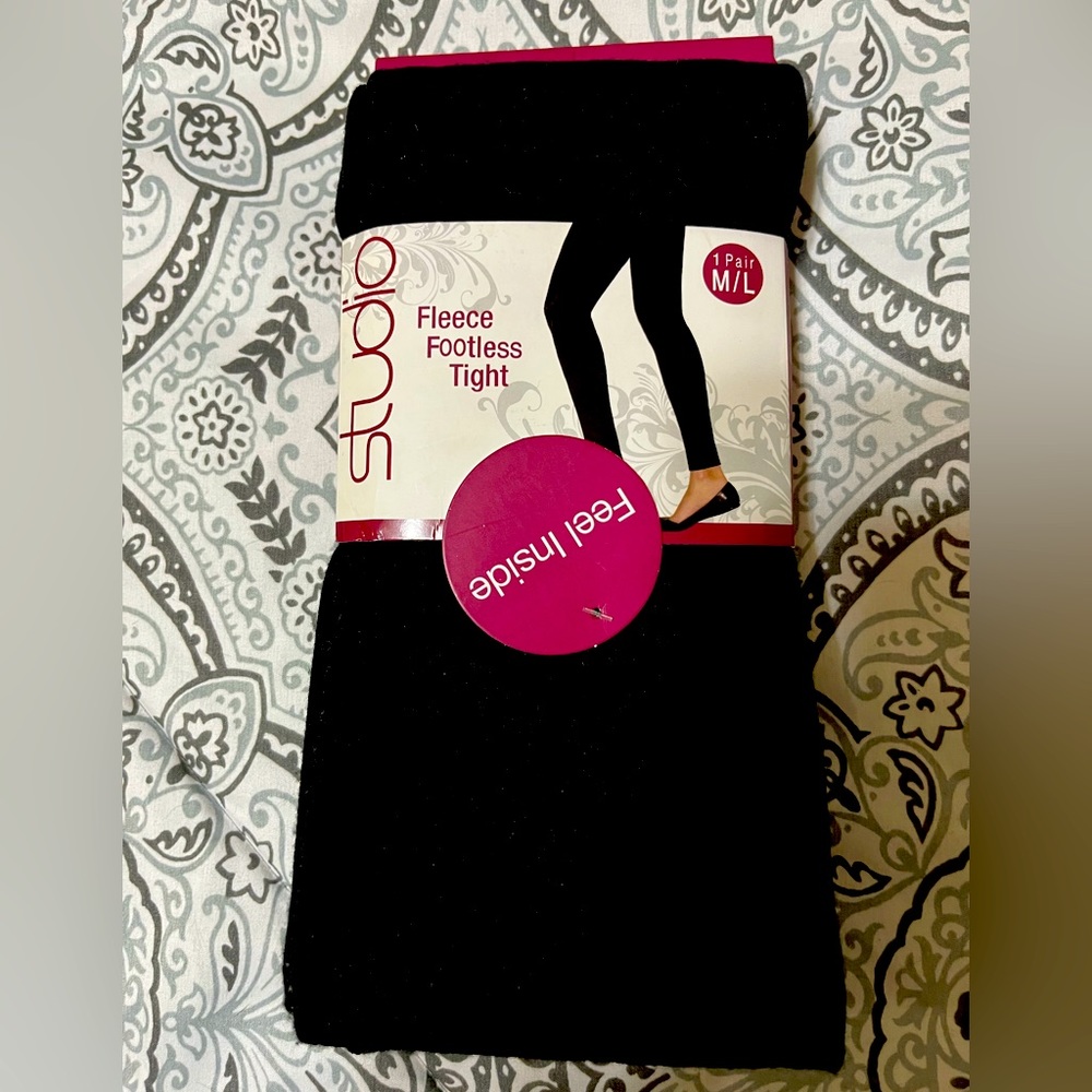 NEW in package Black leggings size medium/large